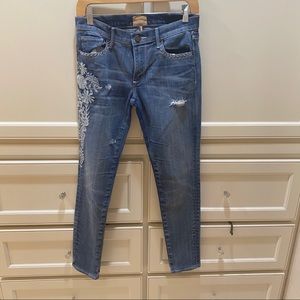 Distressed embroidered skinny jean